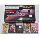 Nintendo retro gaming entertainment system, NES version action set in original box with games