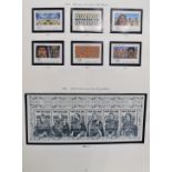 A large mostly modern mint New Zealand stamp collection in six Stanley Gibbons albums and five