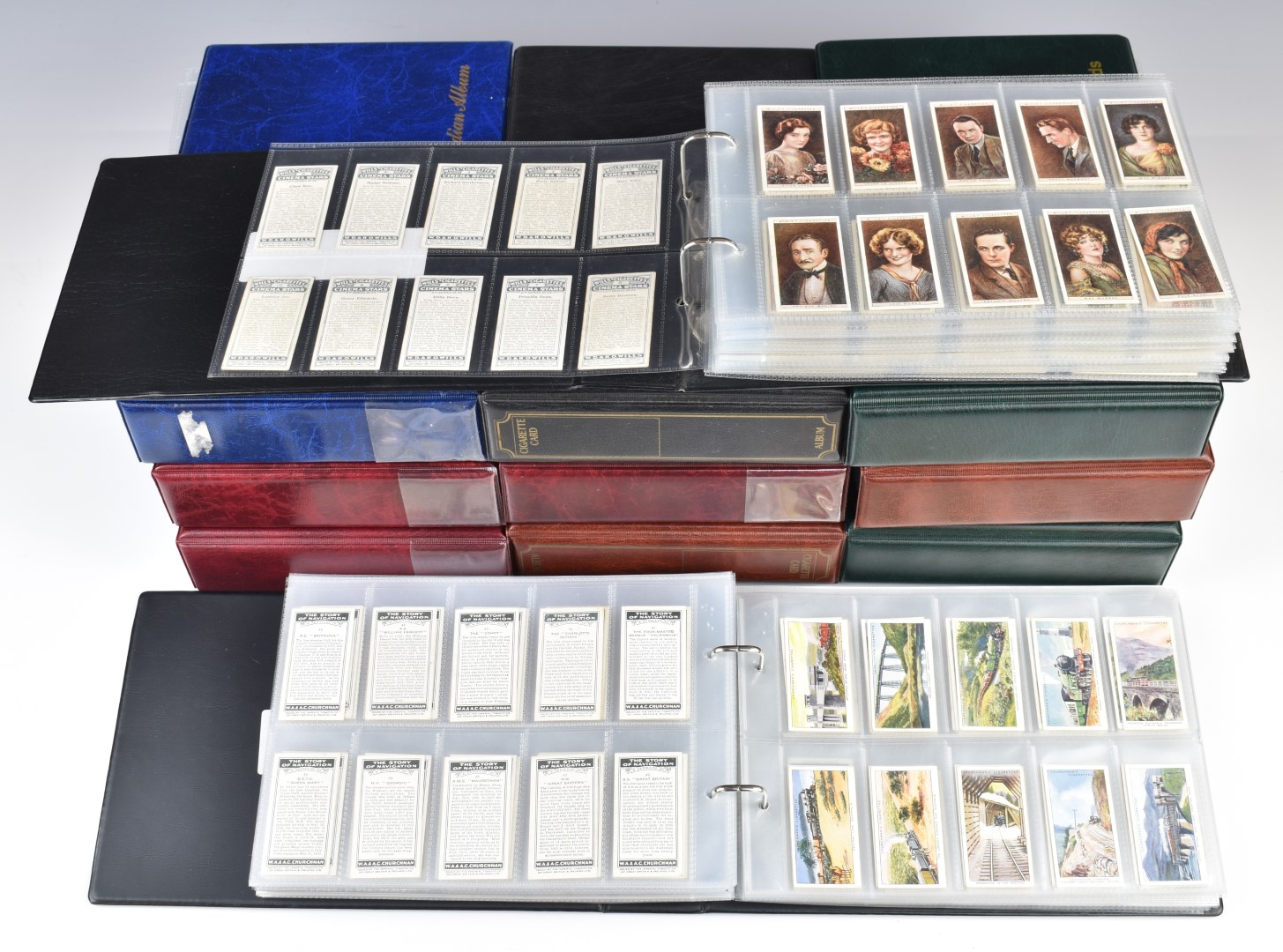 Thirteen albums of cigarette cards including Wills's, Player's and Gallaghers, mostly sets, trade