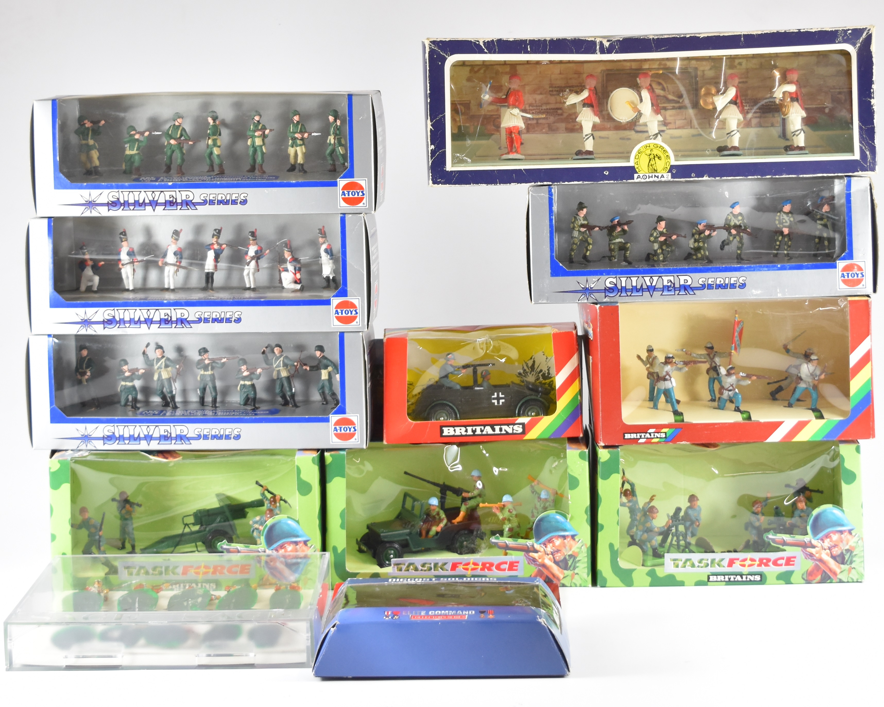 Twelve toy soldier sets to include Britains Task Force, Wild West and German Scout Car, all in