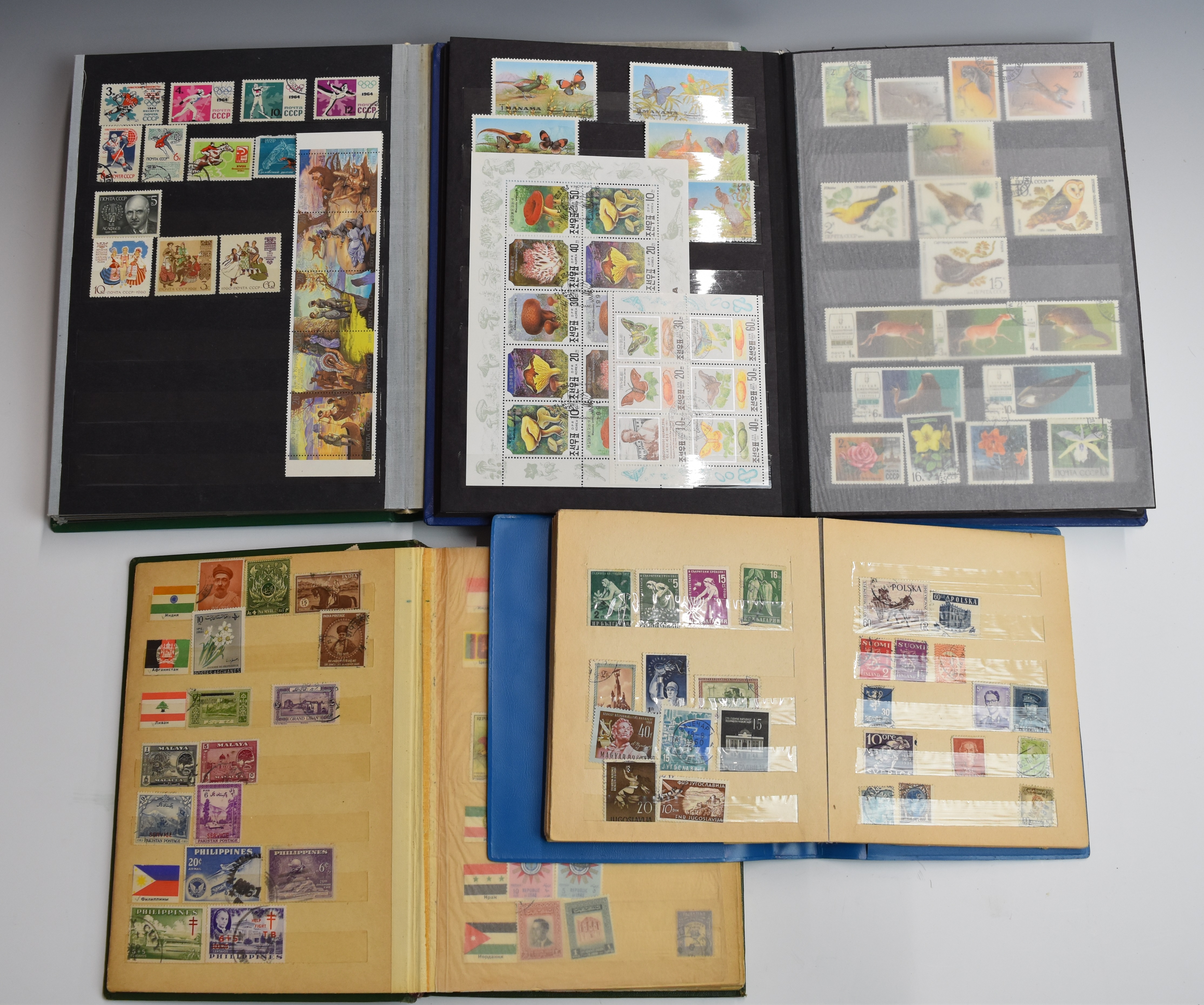 A selection of world stamps in four stockbooks, including USSR, Mongolia, Latvia etc - Image 4 of 5