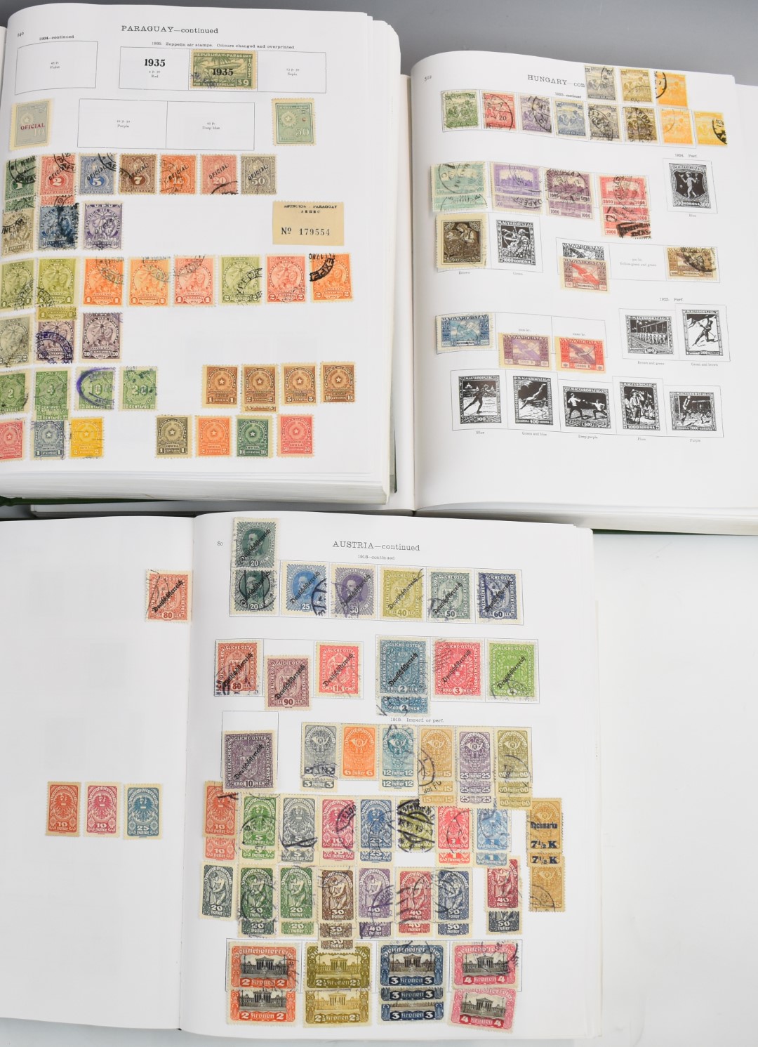 A mint and used world stamp collection in three new Ideal foreign countries postage stamp albums,