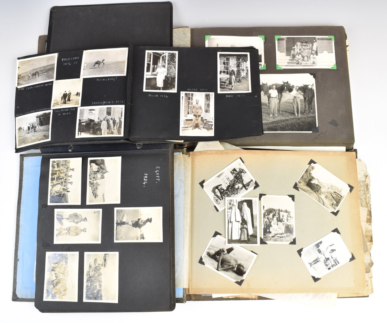 Three albums of black and white photographs and loose items, mostly relating to India and Egypt