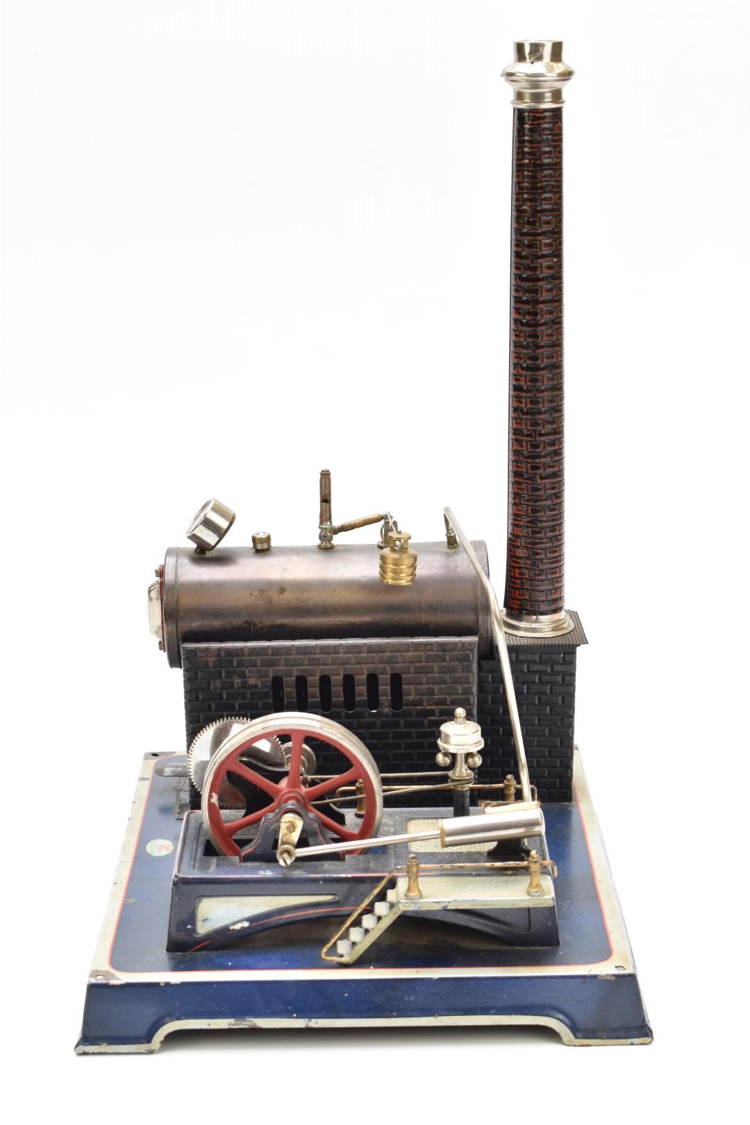 Doll and Cie stationary live steam engine, the boiler with faux brickwork base and chimney, the