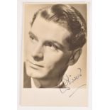 Laurence Olivier autographed 14 x 9cm postcard, signed to the lower right side in blue ink.