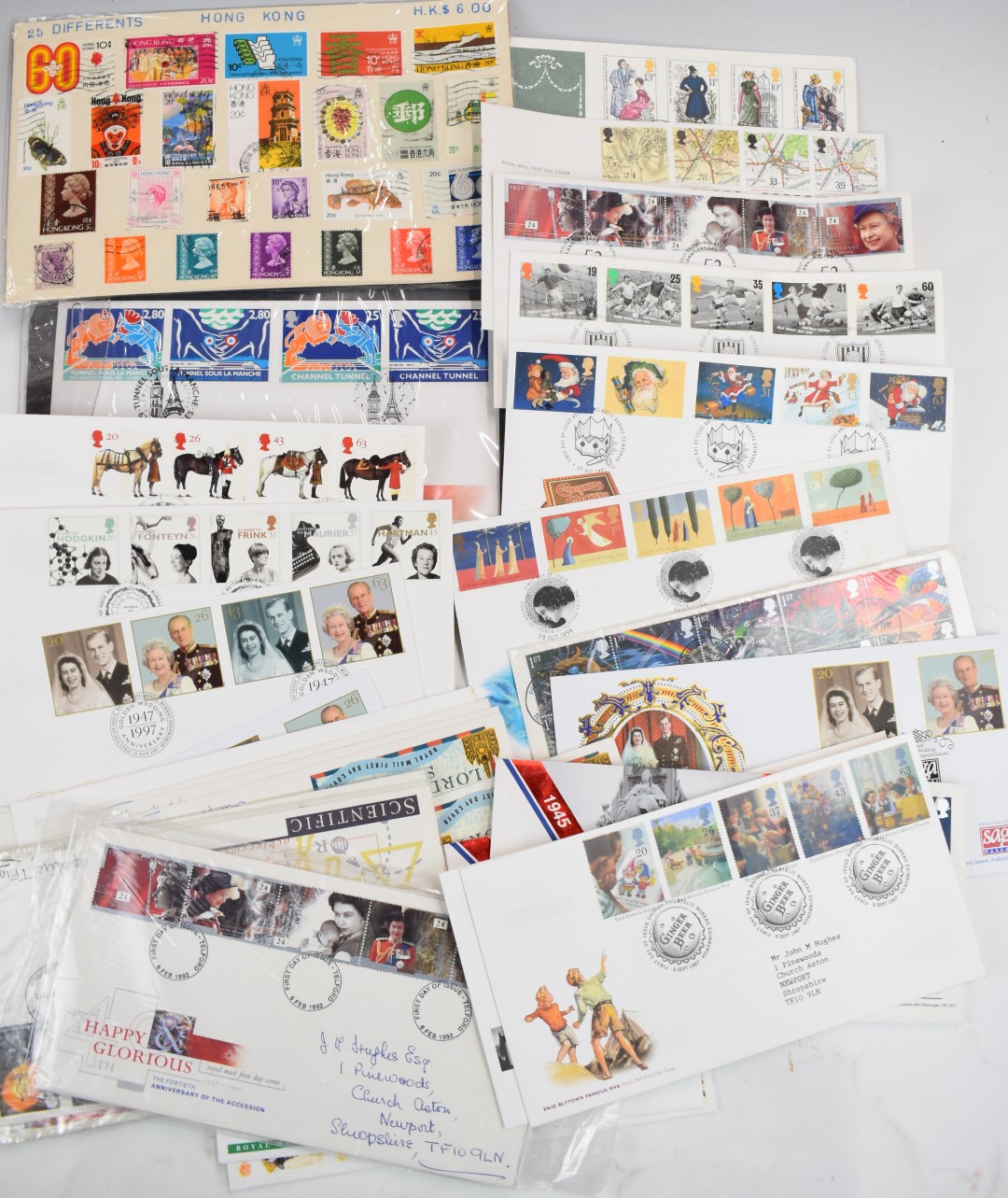 A large GB and world stamp accumulation including first day covers in an album, folders and loose