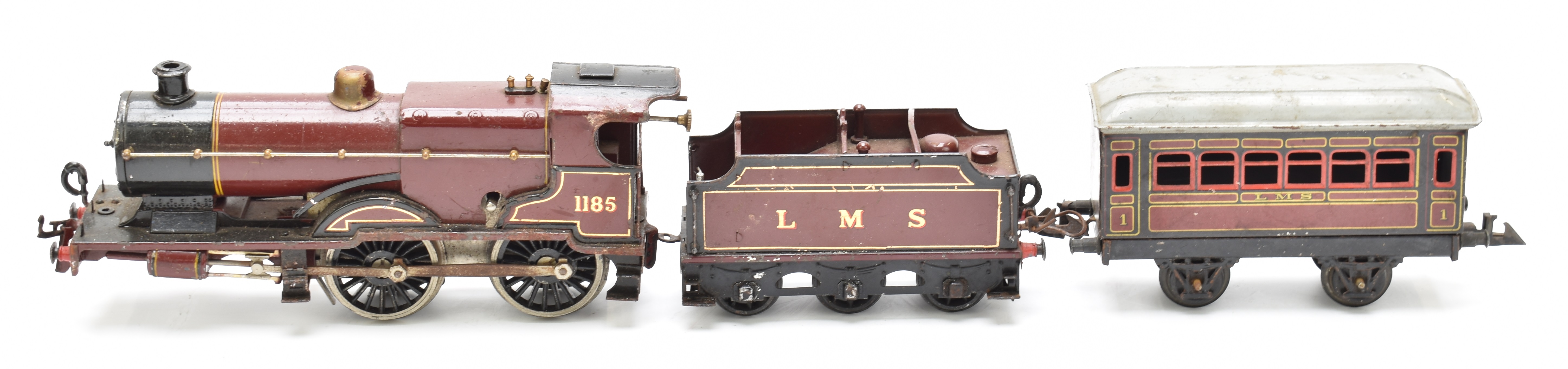 Hornby and Bing 0 gauge model railway items comprising Hornby clockwork 4-4-0 tender locomotive, - Image 2 of 11
