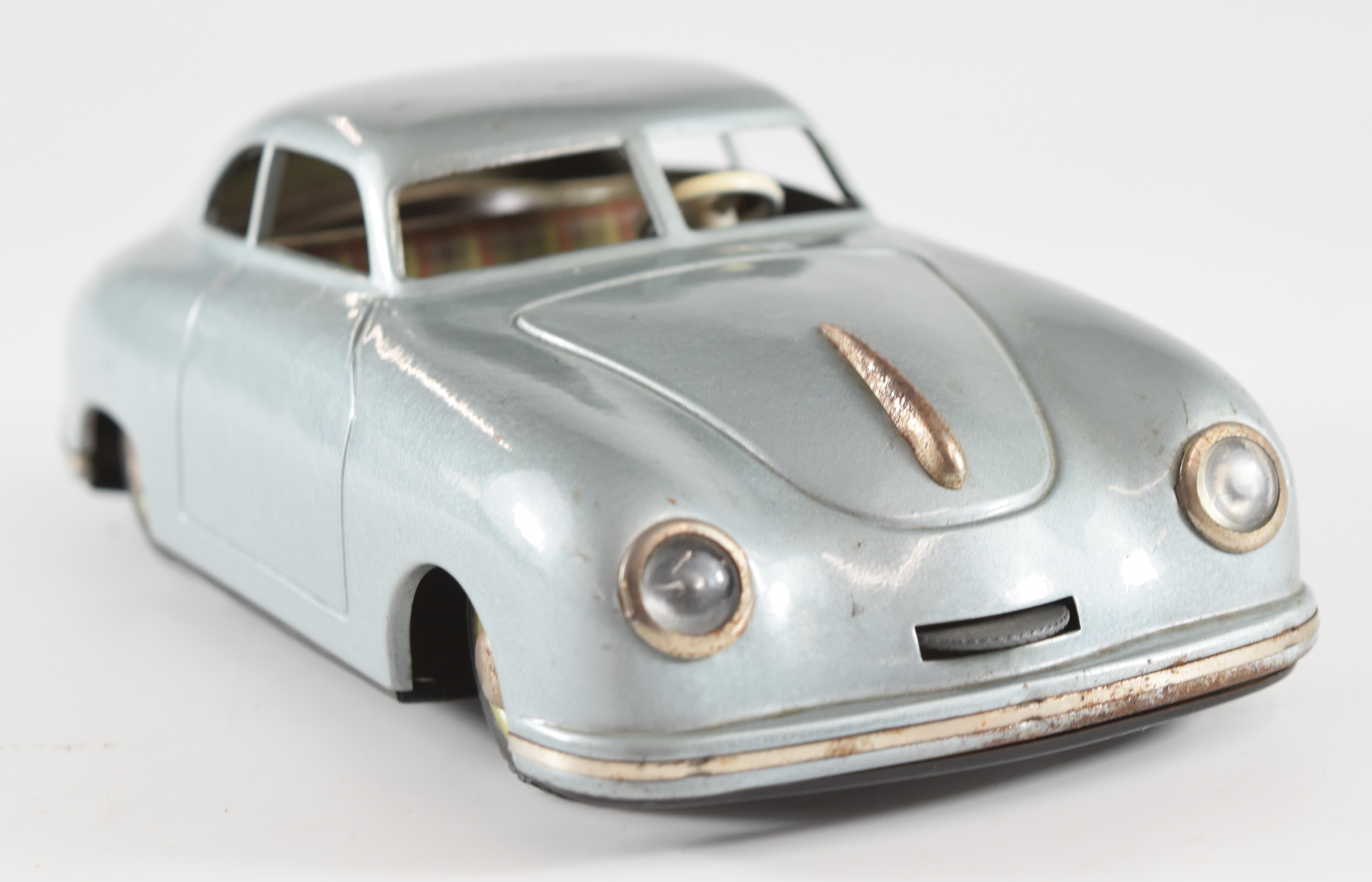 JNF Prototyp Porsche 356 tinplate clockwork car with metallic blue body and plaid interior. - Image 4 of 5