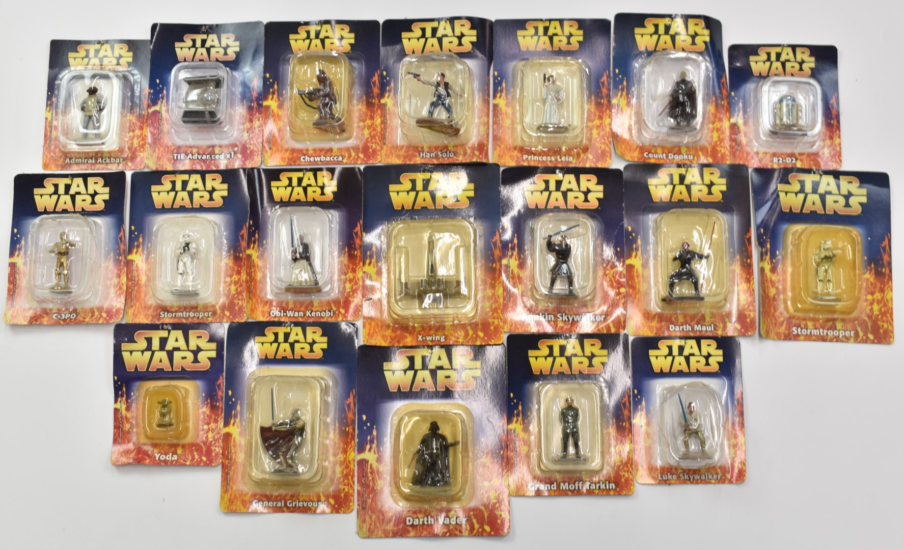 Twenty three Star Wars miniatures by DeAgostini together with a Kenner box set, collectible coins