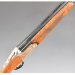 Kofs Zenith 12 bore over and under ejector shotgun with engraved locks and underside, chequered