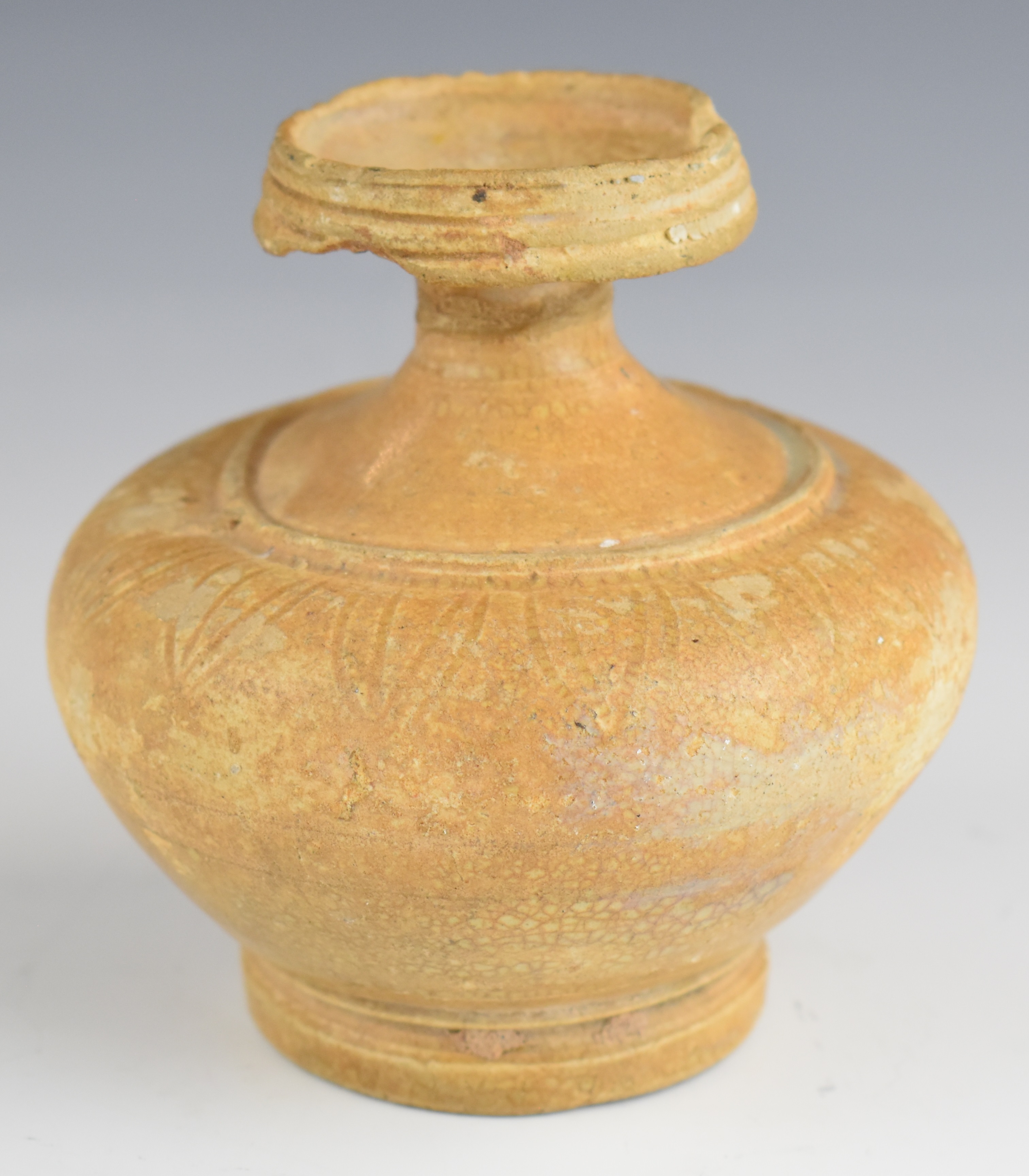 Persian earthenware oil vessel, height 9.5cm