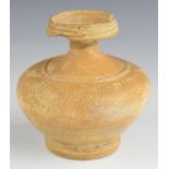 Persian earthenware oil vessel, height 9.5cm