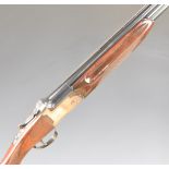 AYA Yeoman 12 bore over under ejector shotgun with named and border engraved locks, chequered semi-