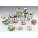 A collection of Indian, Chinese and Eastern enamelled vases, covered pots and miniature teapot,
