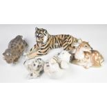 Five Copenhagen animal figures including tigress with cub, Polar Bear cub etc, tallest 14cm