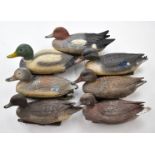 Seven Sportplast and similar plastic floating duck decoys.