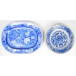 18thC Delft plate and a 19thC transfer decorated plate with bird decoration, largest 26 x 32cm