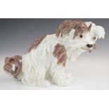 19thC Meissen Bolognese dog with early flat base and worn cross swords mark partially visible,