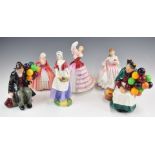 Six Royal Doulton figures and figurines comprising The Balloon Man, The Balloon Seller, Janet, Dawn,