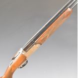 Lincoln 12 bore over and under ejector shotgun with engraved scenes of dogs and birds to the