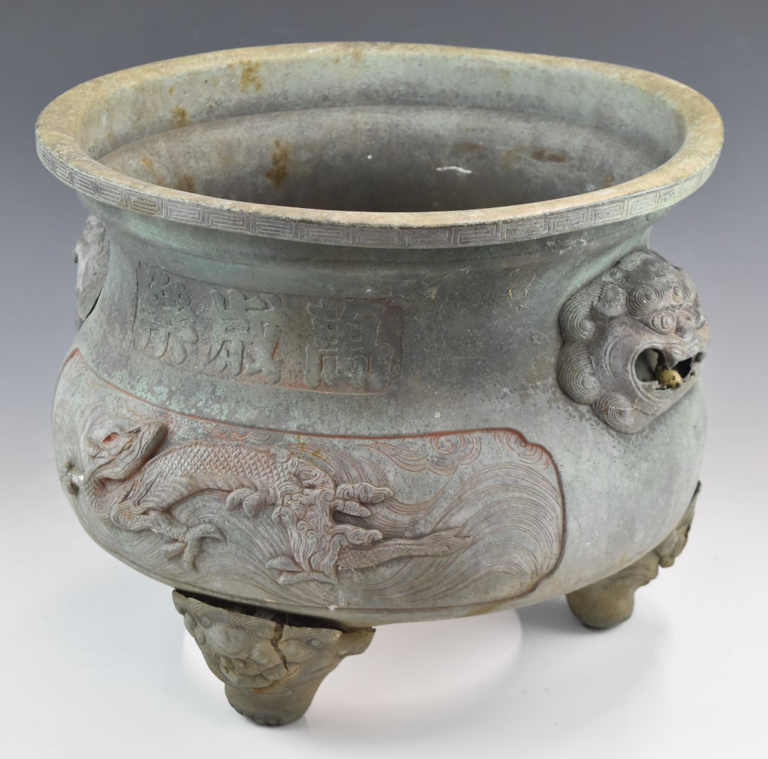 Chinese bronze jardiniere, possibly Ming, with relief moulded dragon and script decoration, raised - Image 2 of 3