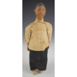 Chinese 'Door of Hope' doll wearing a black dress and cream jacket, with carved bun hairstyle,