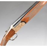 Fair LX600 12 bore over and under ejector shotgun with engraved scenes of birds to the locks and