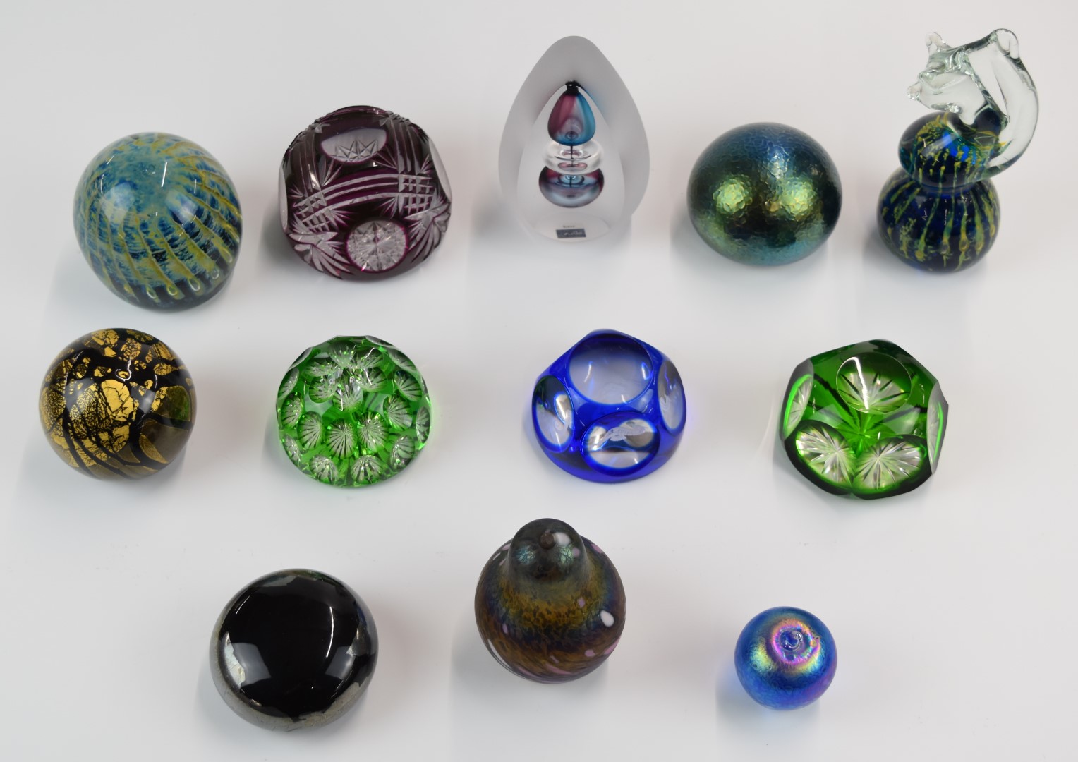 Twelve various glass paperweights including Mdina, Alum Bay, Svaga, Chris Dodds, iridescent, flash