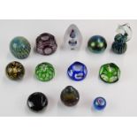 Twelve various glass paperweights including Mdina, Alum Bay, Svaga, Chris Dodds, iridescent, flash