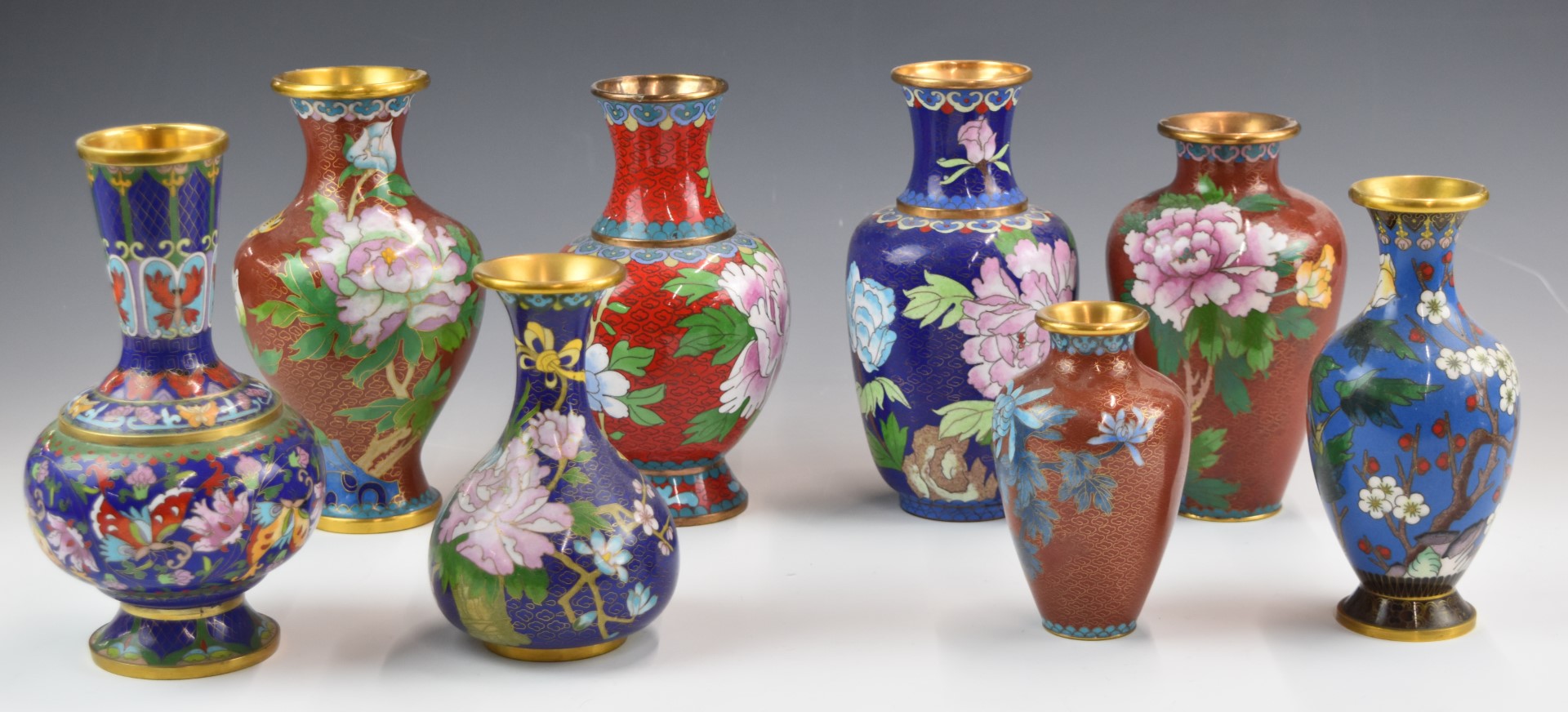 Eight Chinese cloisonné vases, tallest 21cm