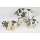 Copenhagen three porcelain recumbent cow / calf figures, largest length 27cm x height 11cm