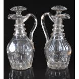 Pair of Regency cut clear glass ewers and stoppers, 28cm tall.