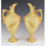 Royal Worcester pair of pedestal ewers with gilded fern decoration, height 31cm