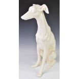 Large ceramic seated greyhound dog figure, height 50cm