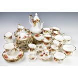 Royal Albert dinner and tea ware decorated in the Old Country Roses pattern, approximately seventy