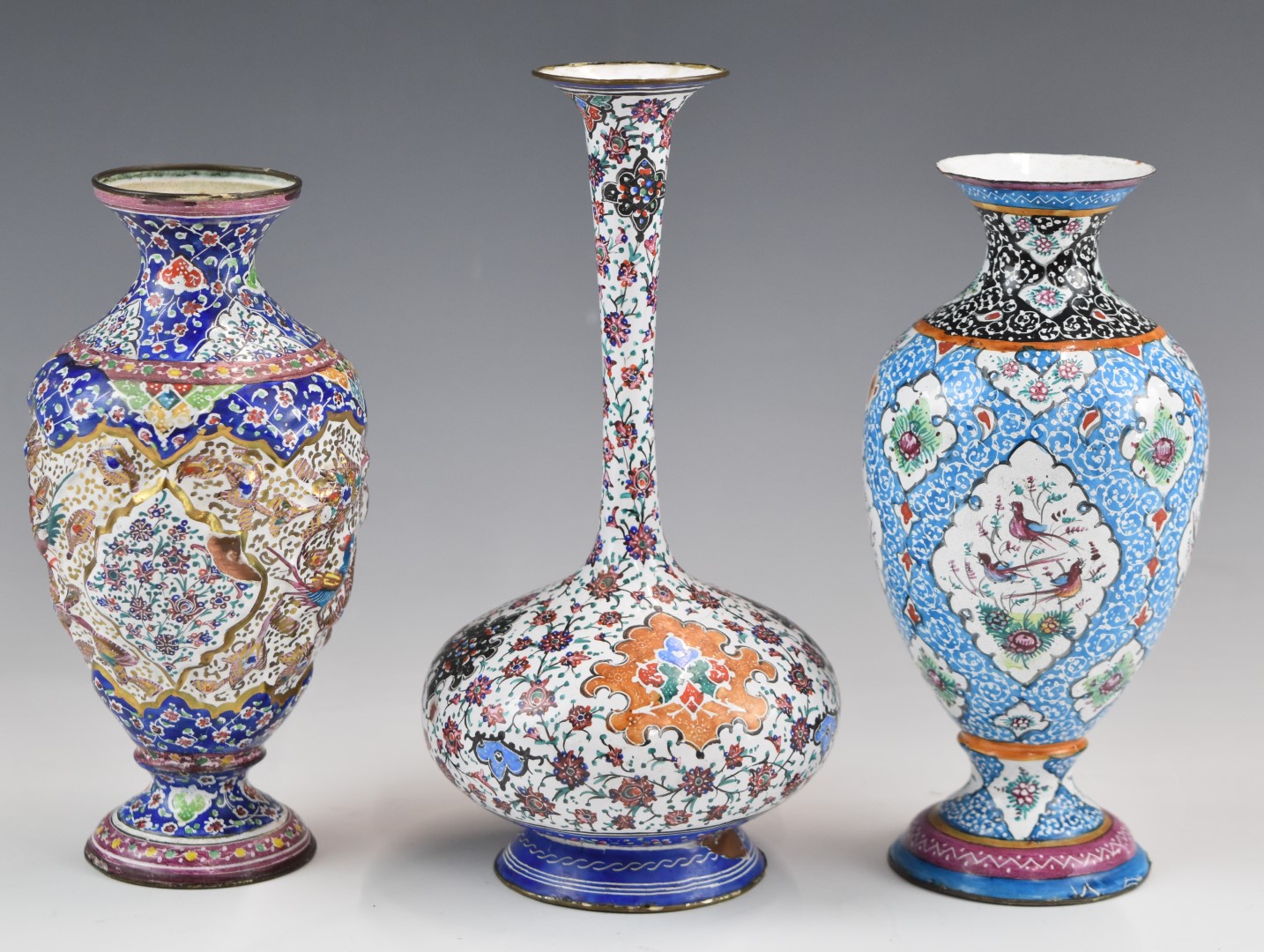 Three Chinese / Indian enamel vases, tallest 17cm