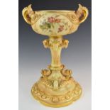 Royal Worcester blush ivory large centrepiece with figural fish handles, relief moulded ram's head