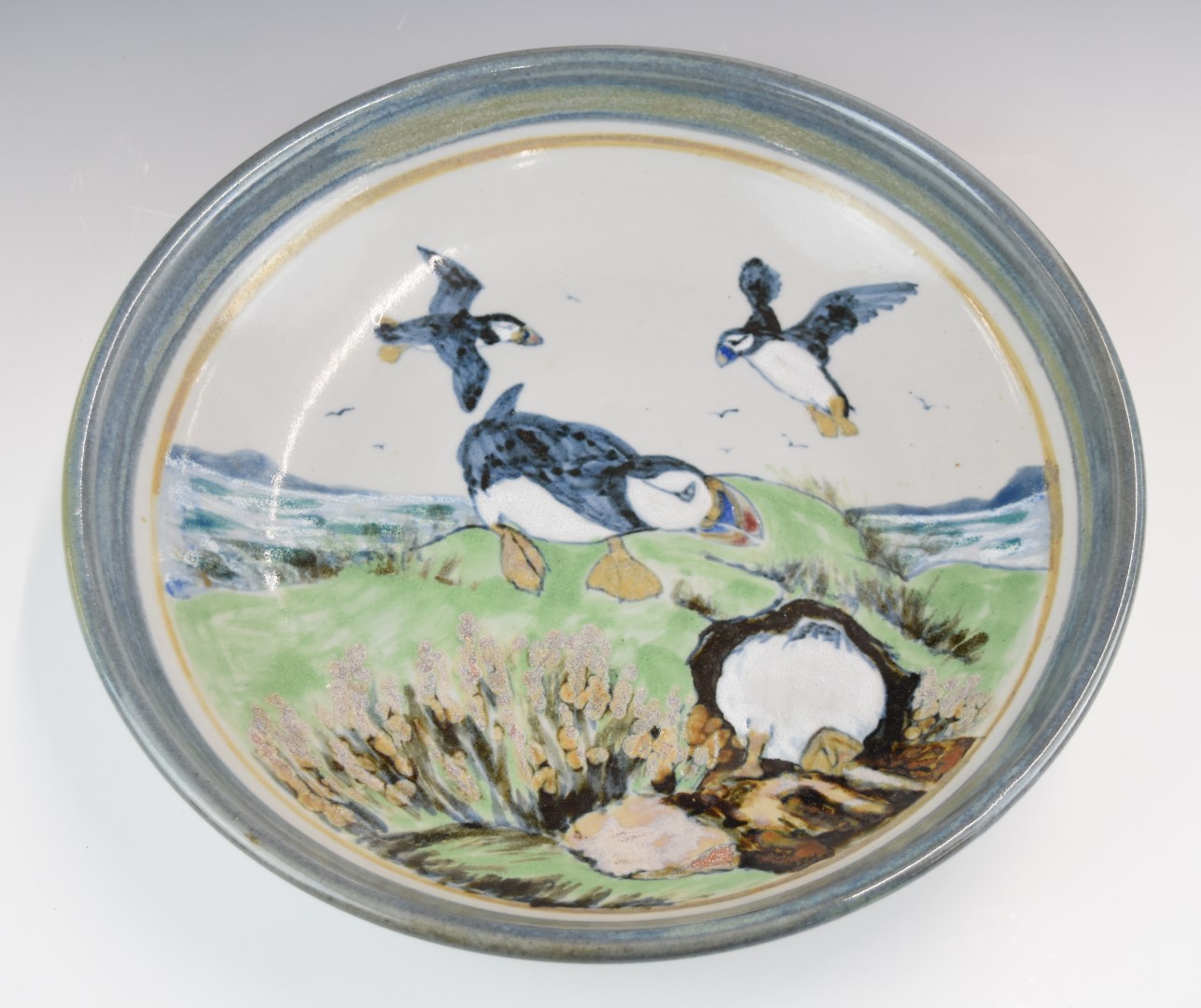 Highland Stoneware large pottery pedestal bowl decorated with puffins in flight returning to their