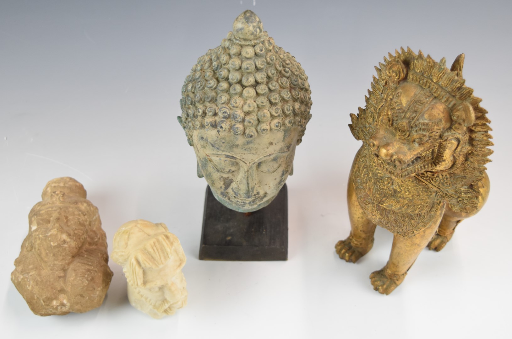 Chinese bronze Dog of Fo, cast metal Buddha bust and carved stone busts - Image 2 of 3