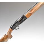 Beretta A301 12 bore three-shot semi-automatic shotgun with engraved locks, chequered semi-pistol