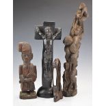 Four African carved tribal items including tree of life figure, finely carved headrest etc,