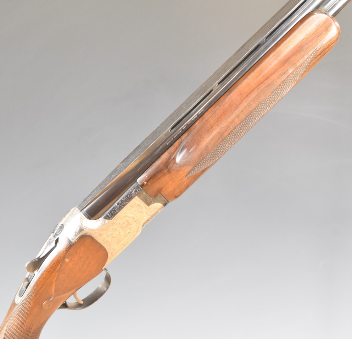 Miroku 12 bore over and under ejector shotgun with engraved locks, underside, trigger guard, top