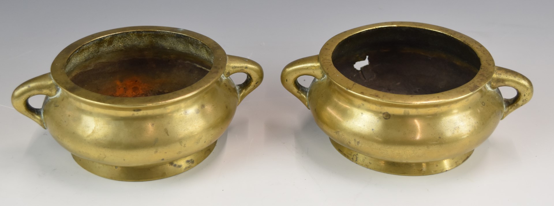 A pair of Chinese 19th / 20thC twin handled pedestal bronze censers with six character marks to - Image 2 of 3