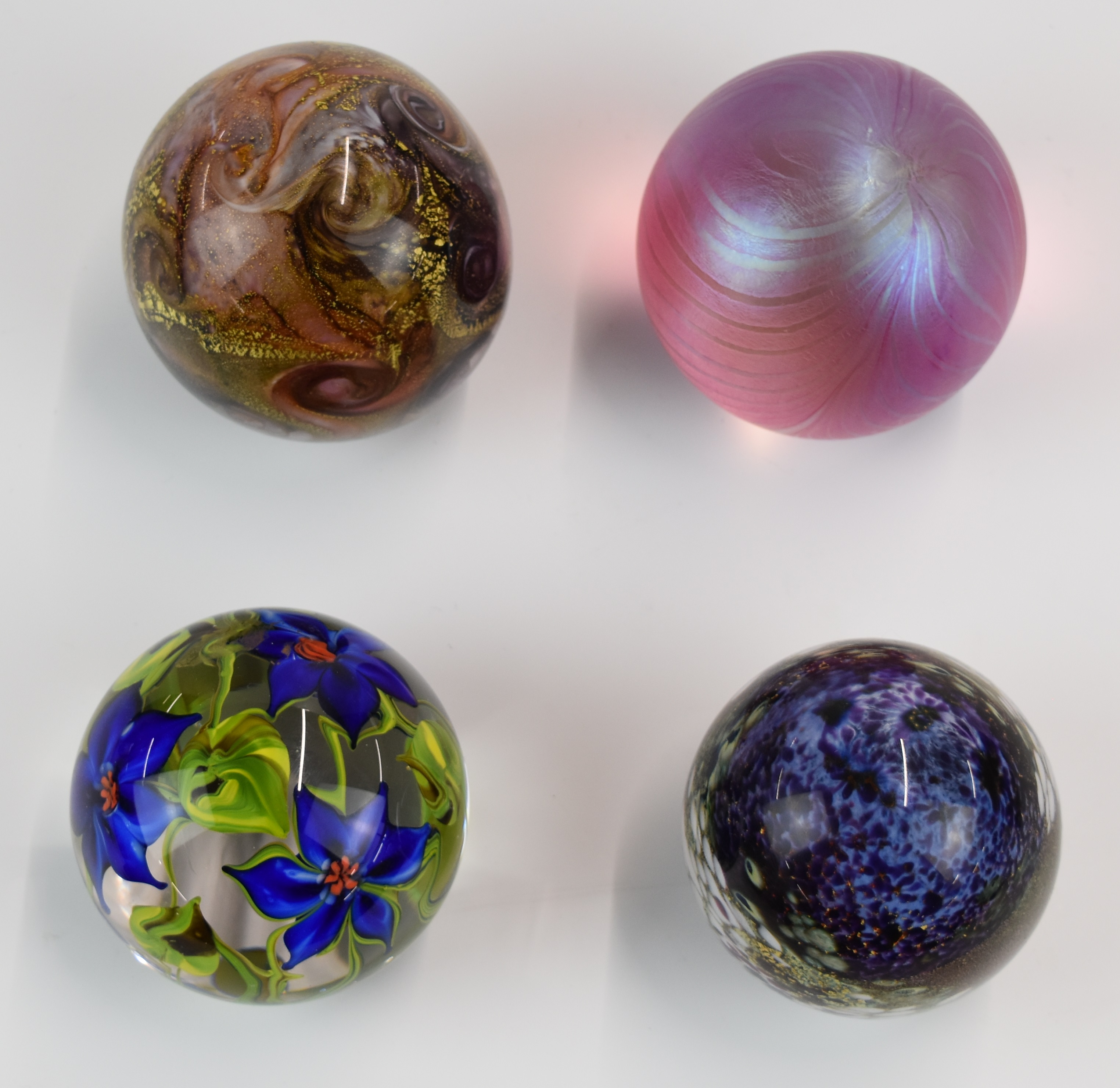 Four studio glass paperweights comprising Isle of White, Jonathan Harris, Andre Zach for Glasform