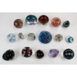 Sixteen glass paperweights and vases including Mdina, Caithness, Isle of Wight, Kosta Boda, Kaj