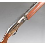 Remington Model 1100 Sporter 12 bore 3-shot semi-automatic shotgun with ornately carved and