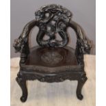 Chinese 19th / 20thC carved wood chair with dragon armrests, width 67cm