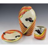 Two Lorna Bailey vases and a charger with relief moulded figural decoration in the Art Deco style,