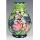 Moorcroft pedestal vase decorated in the Finches pattern, height 14cm