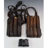 Two M56 SMG leather magazine four compartment holders with carry straps, together with glock 17.22